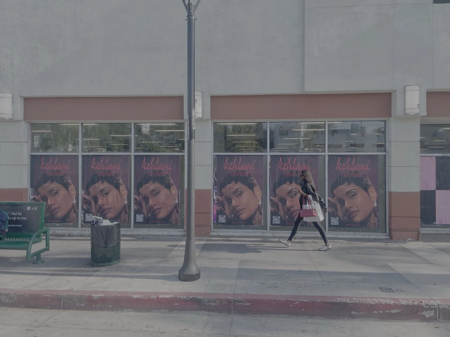 Eye-level music campaign installed across storefront windows